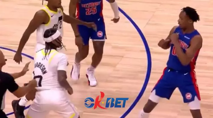 a 2 basketball player fighting in a game Jordan Clarkson